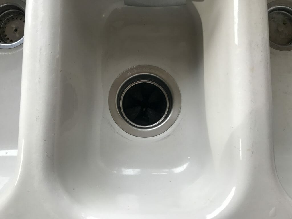 Close up shot of a kitchen sink drain