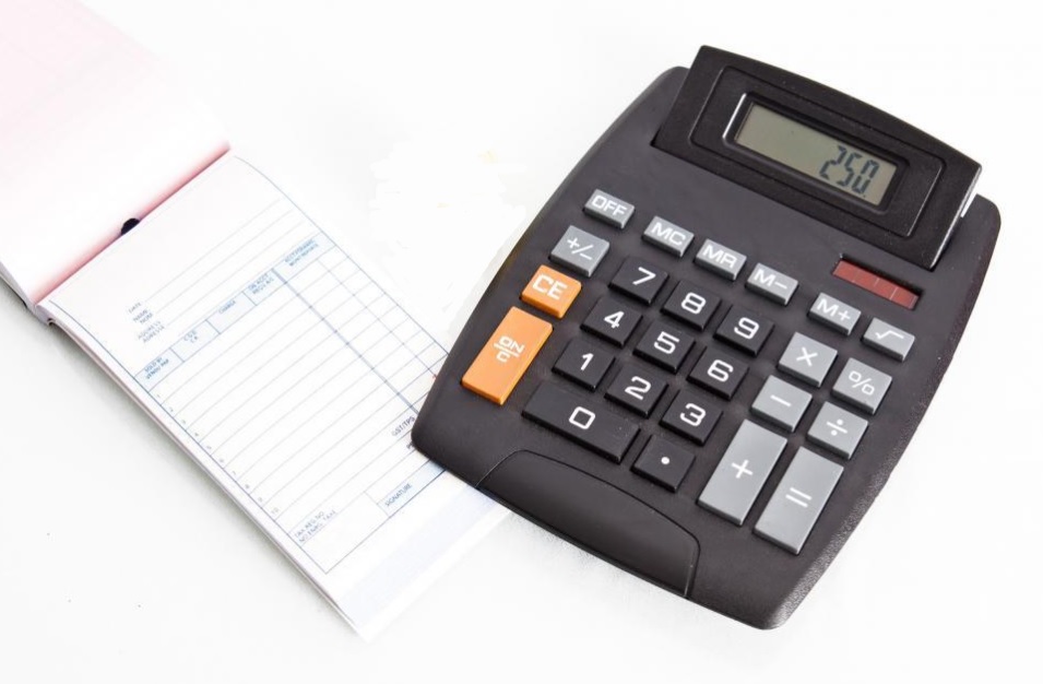 A calculator and notepad